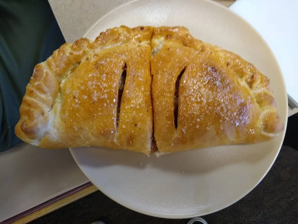 Pepperoni Sausage and Bacon Calzone